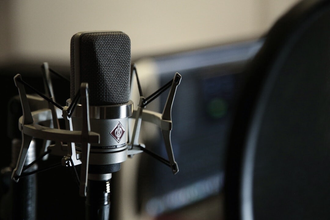 Podcast recording studio setup with microphone and headphones